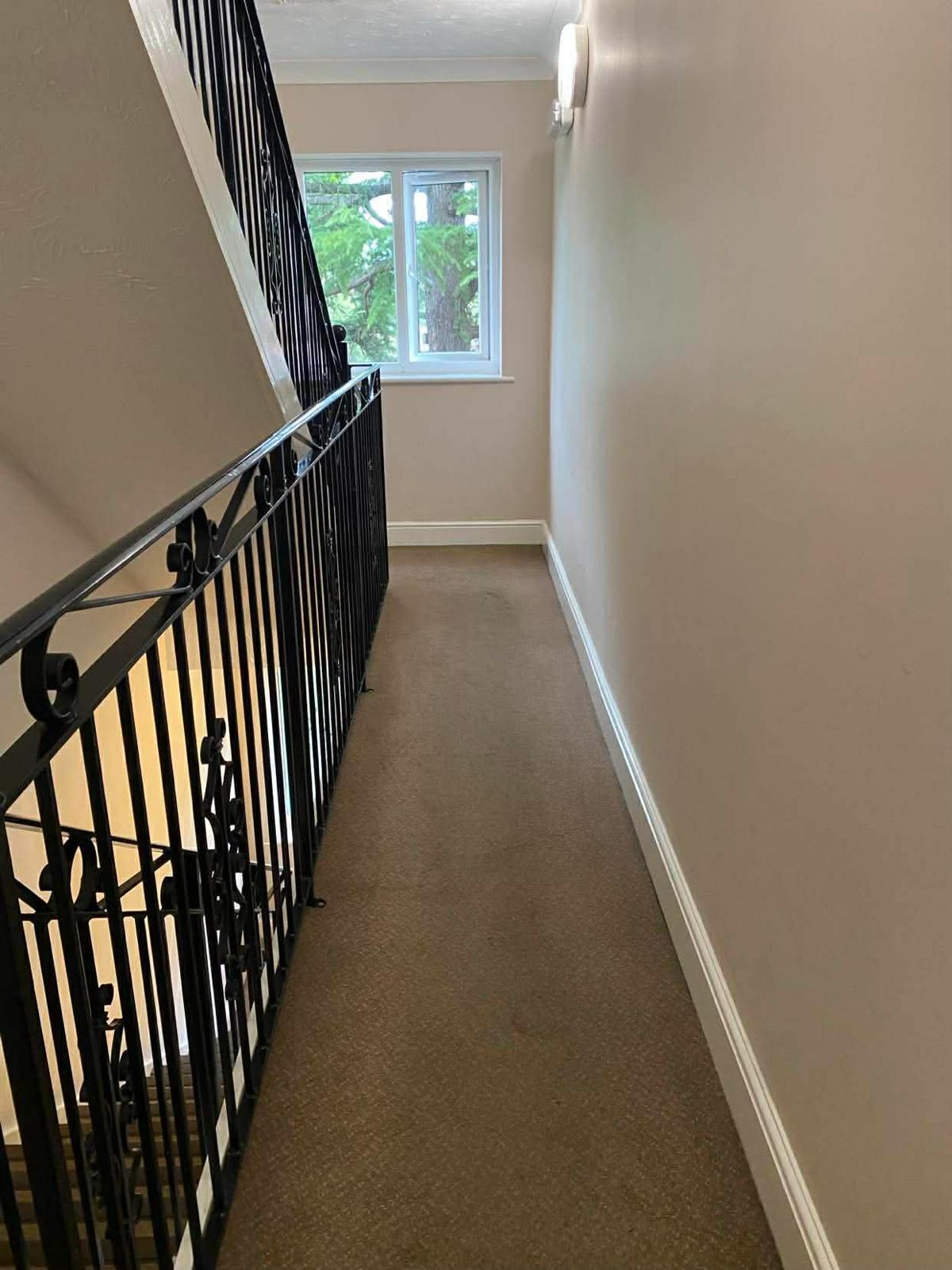 Upper landing and window in the second Epsom block